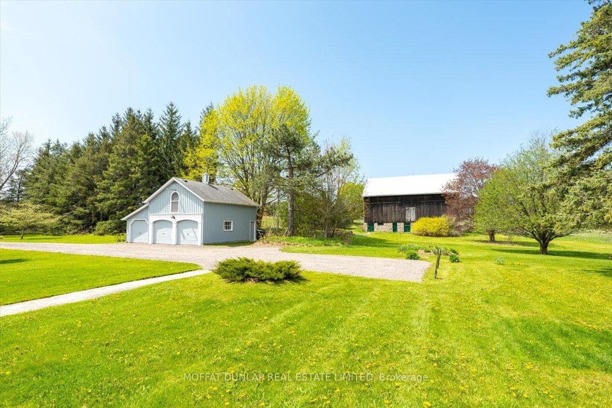 View Toward Garage with Loft and Century Barn