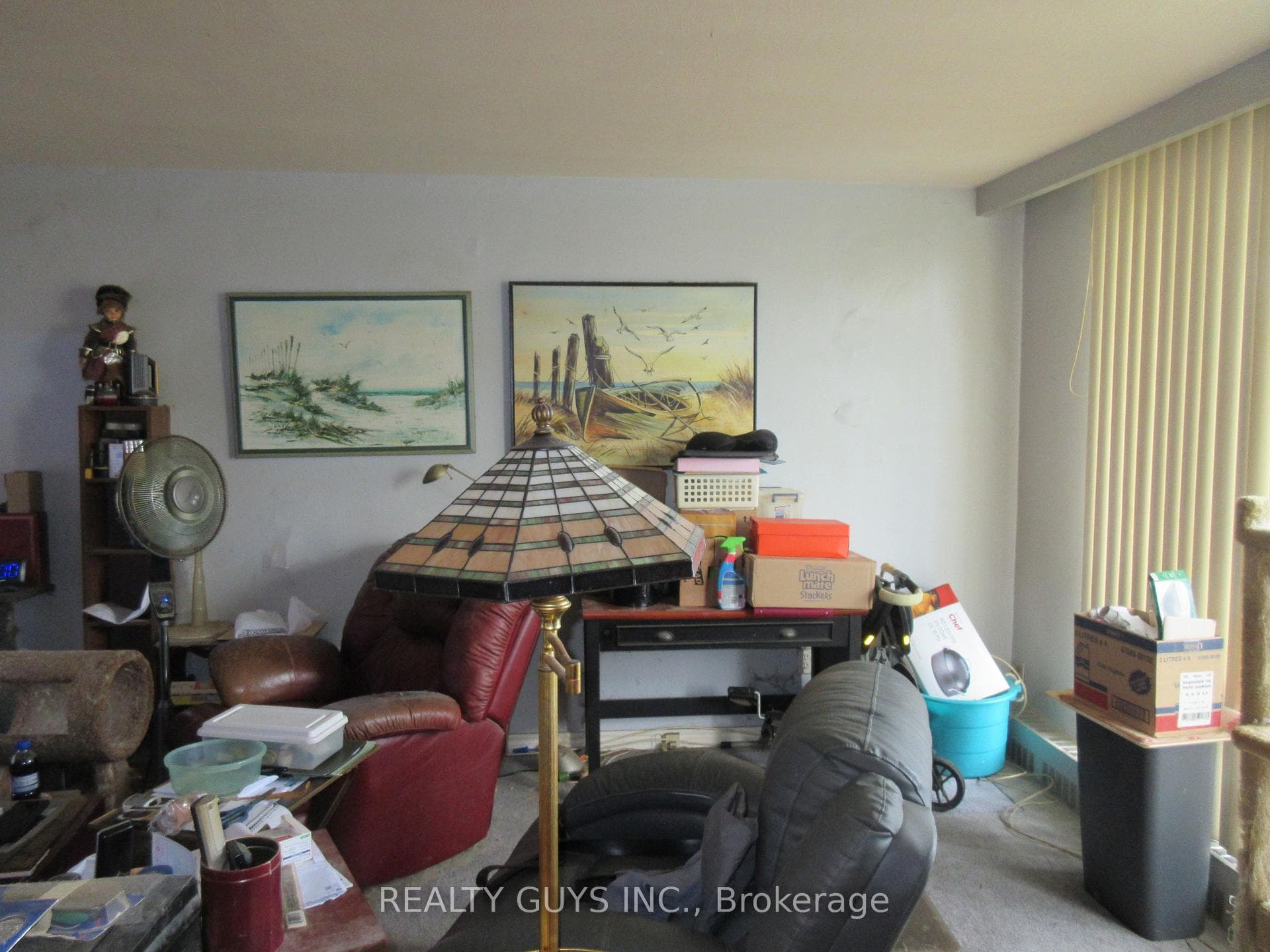 LIVING ROOM WITH SLIDING DOORS OUT TO BALCONY