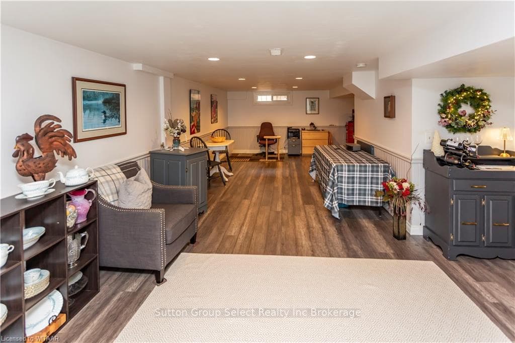 Living room featuring dark hardwood / wood-style f