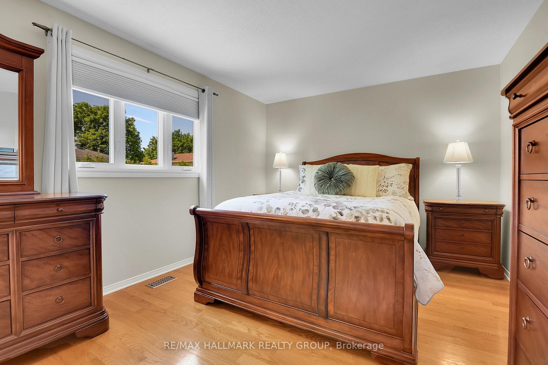 PRIMARY | hardwood flooring, looks onto backyard
