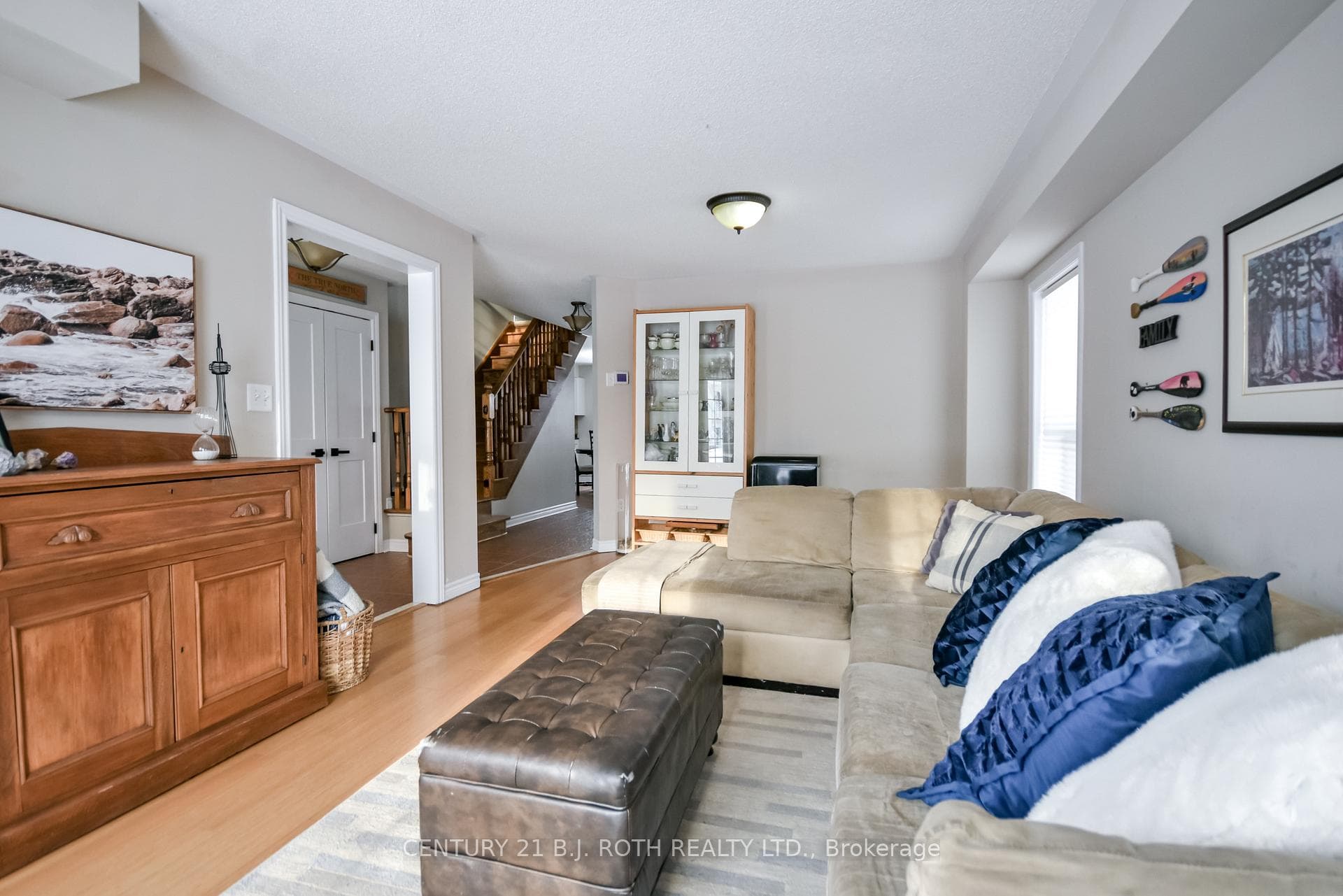 Spacious living room with hardwood floors!