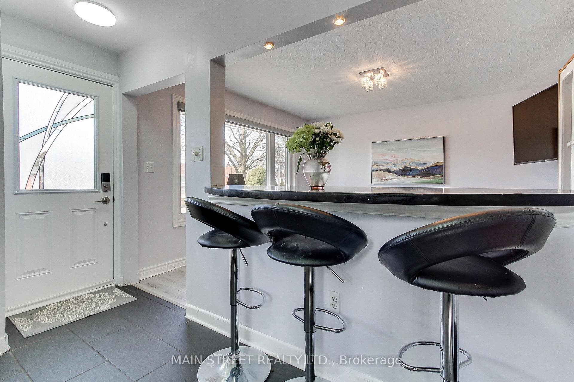 Breakfast Bar Overlooks Living Room