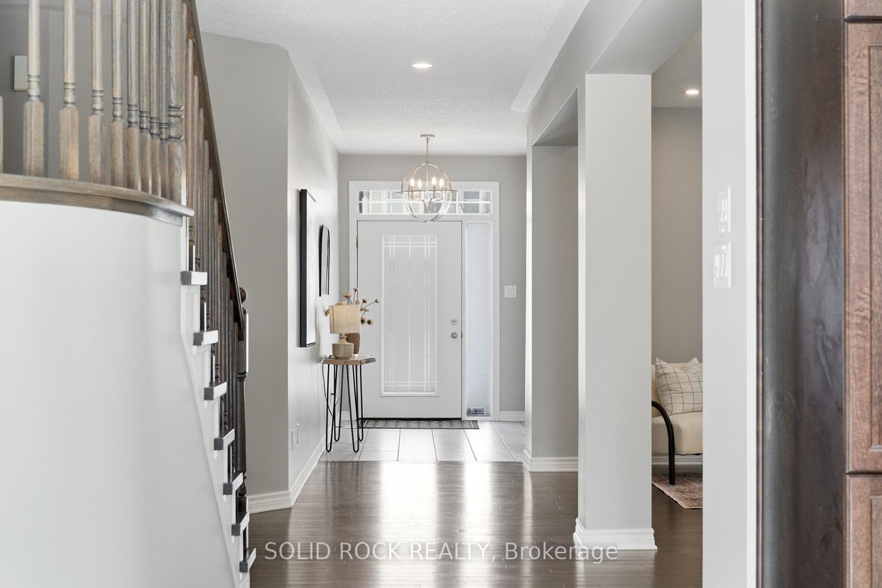 Rich wood floors set a timeless tone
