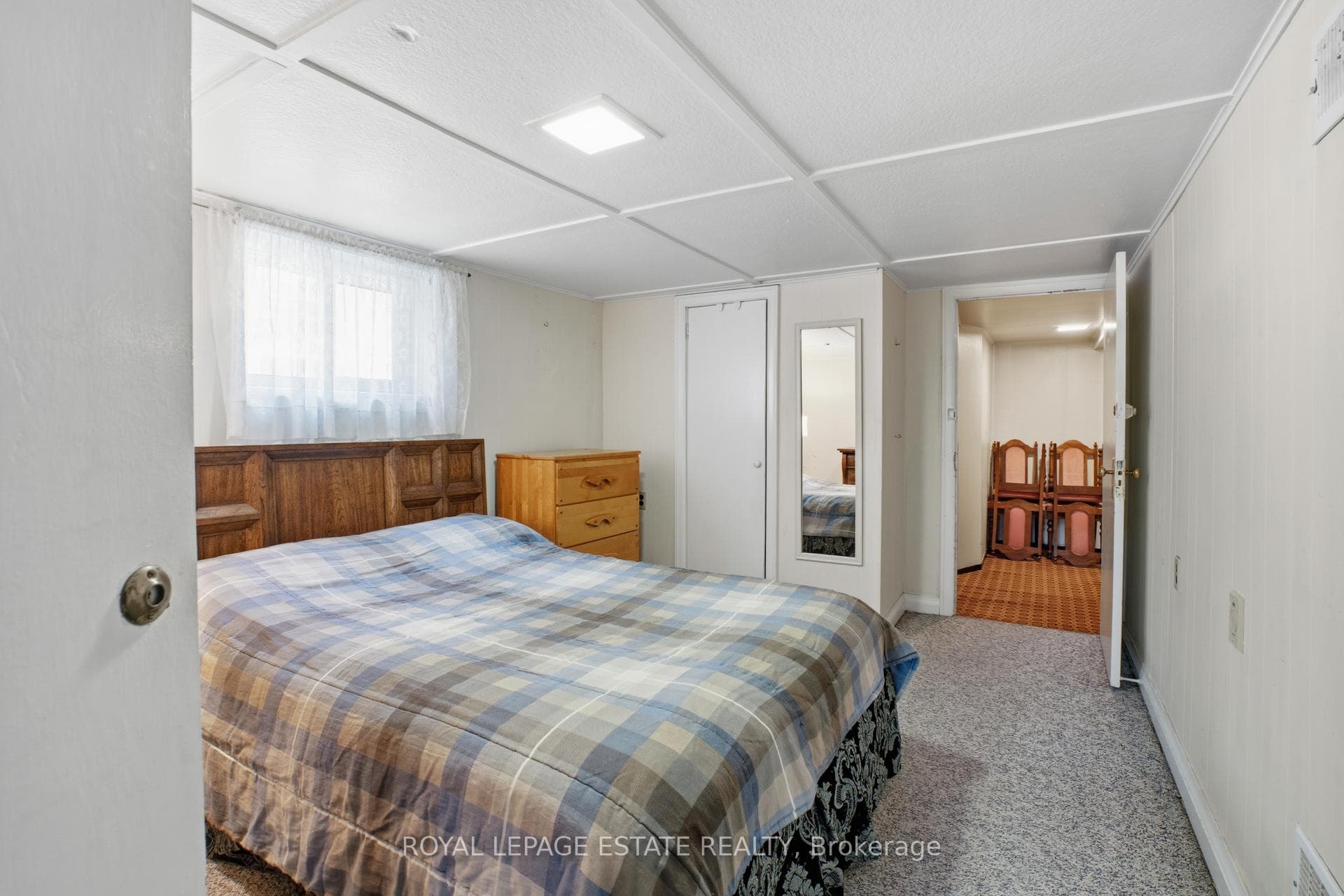 basement bedroom, closet, window