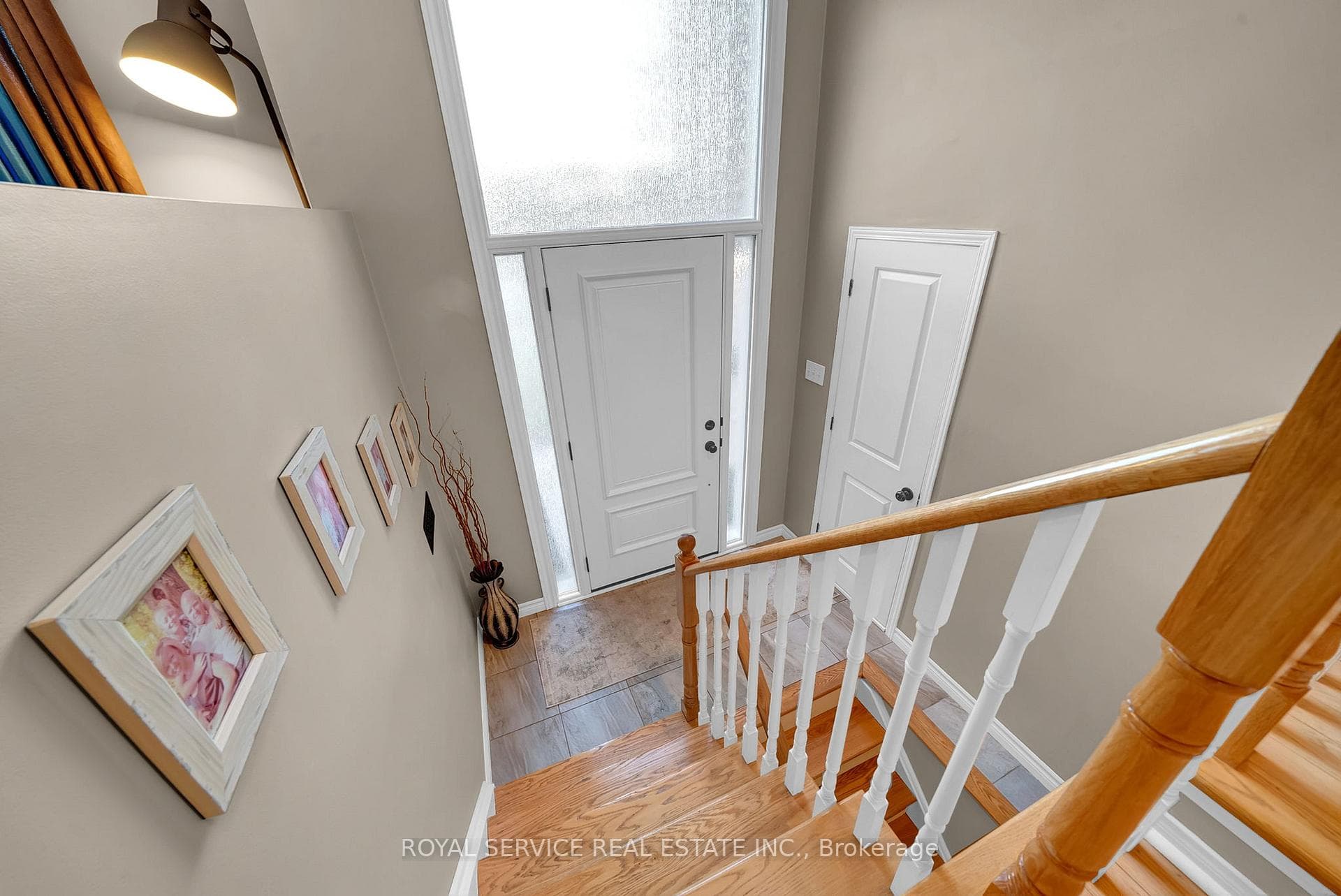 Soaring Ceilings & Windows Greet you in the Foyer