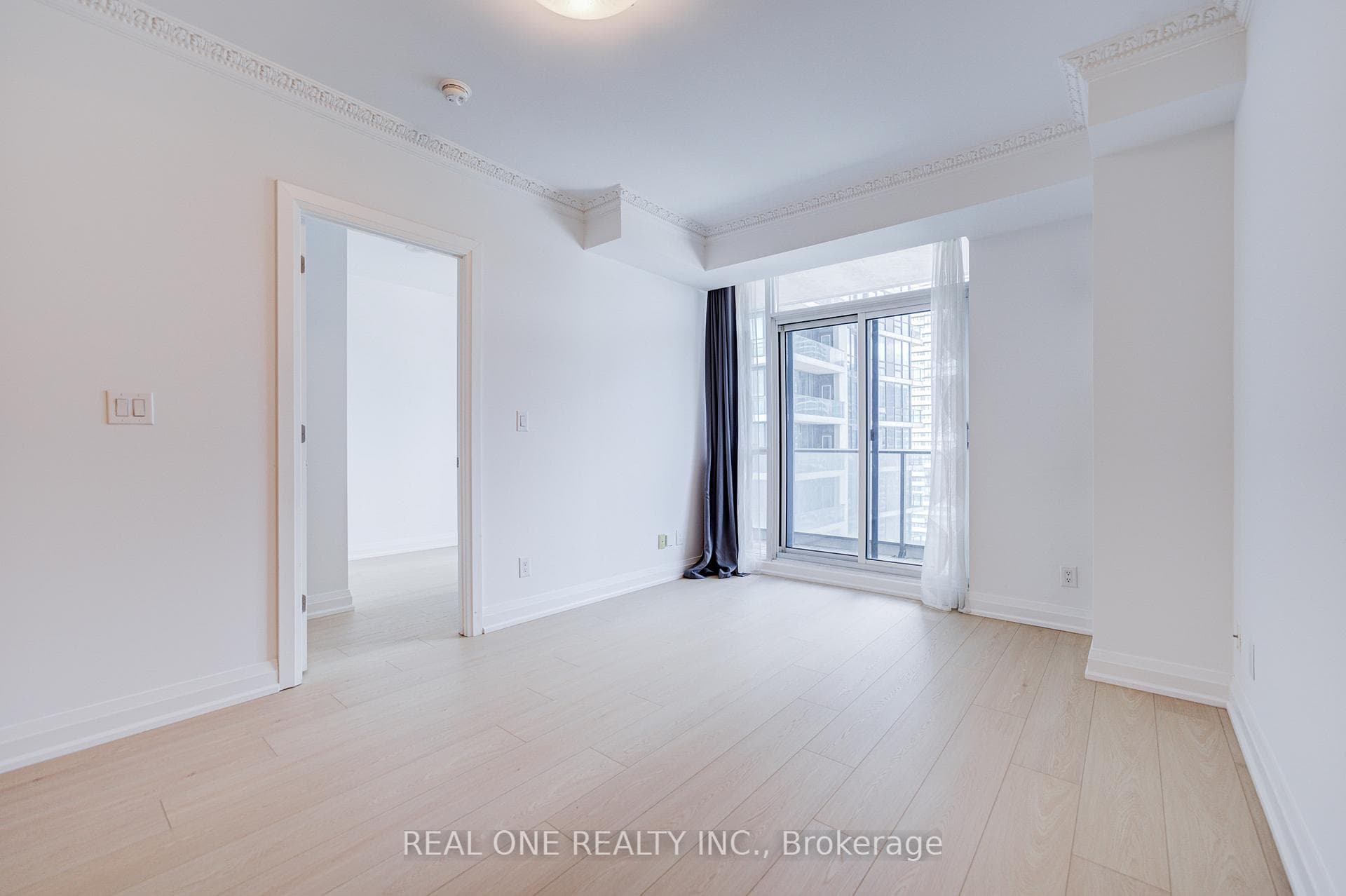 Living Room With Walk Out to Large Balcony