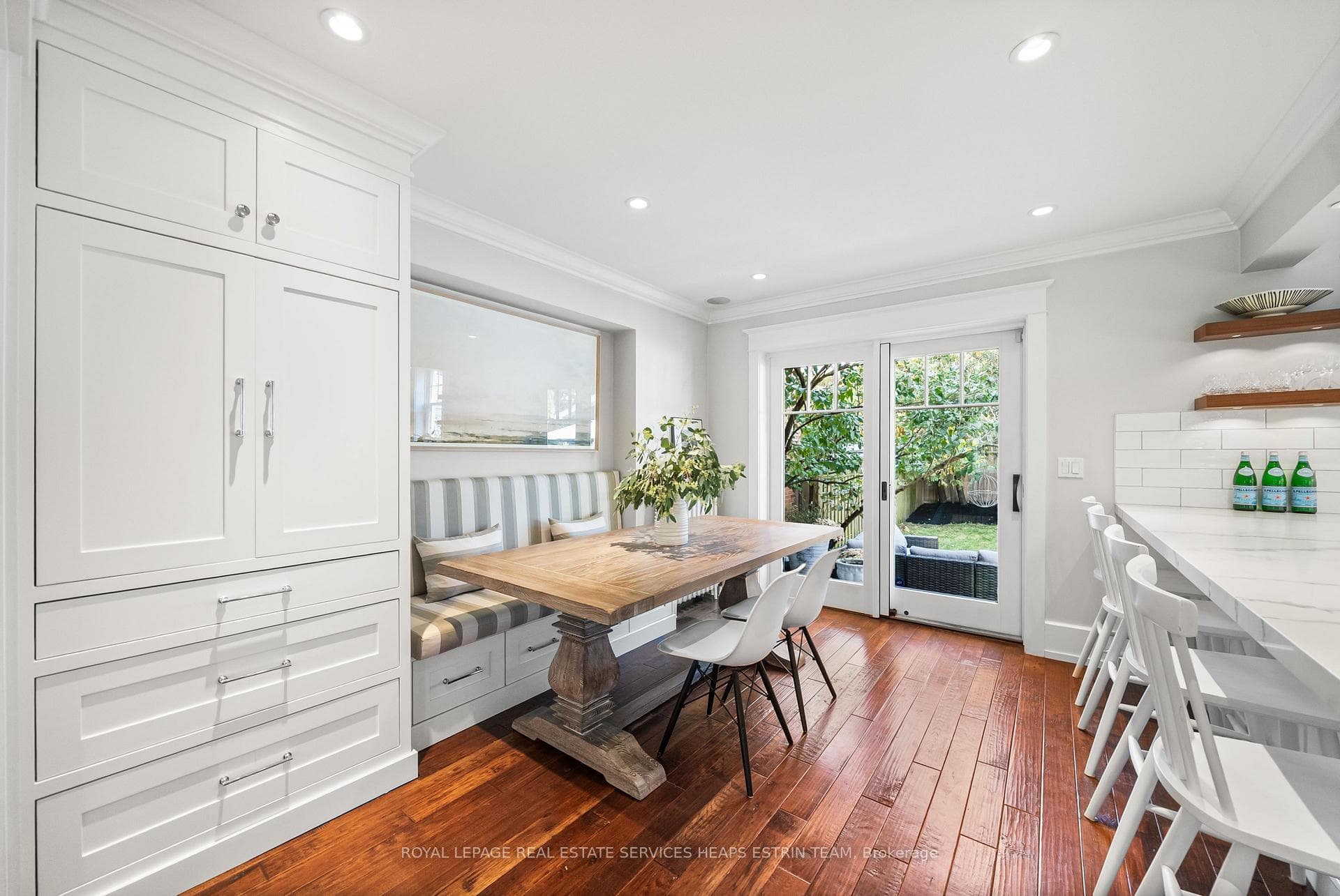 Dining banquette with hidden coffee station beside