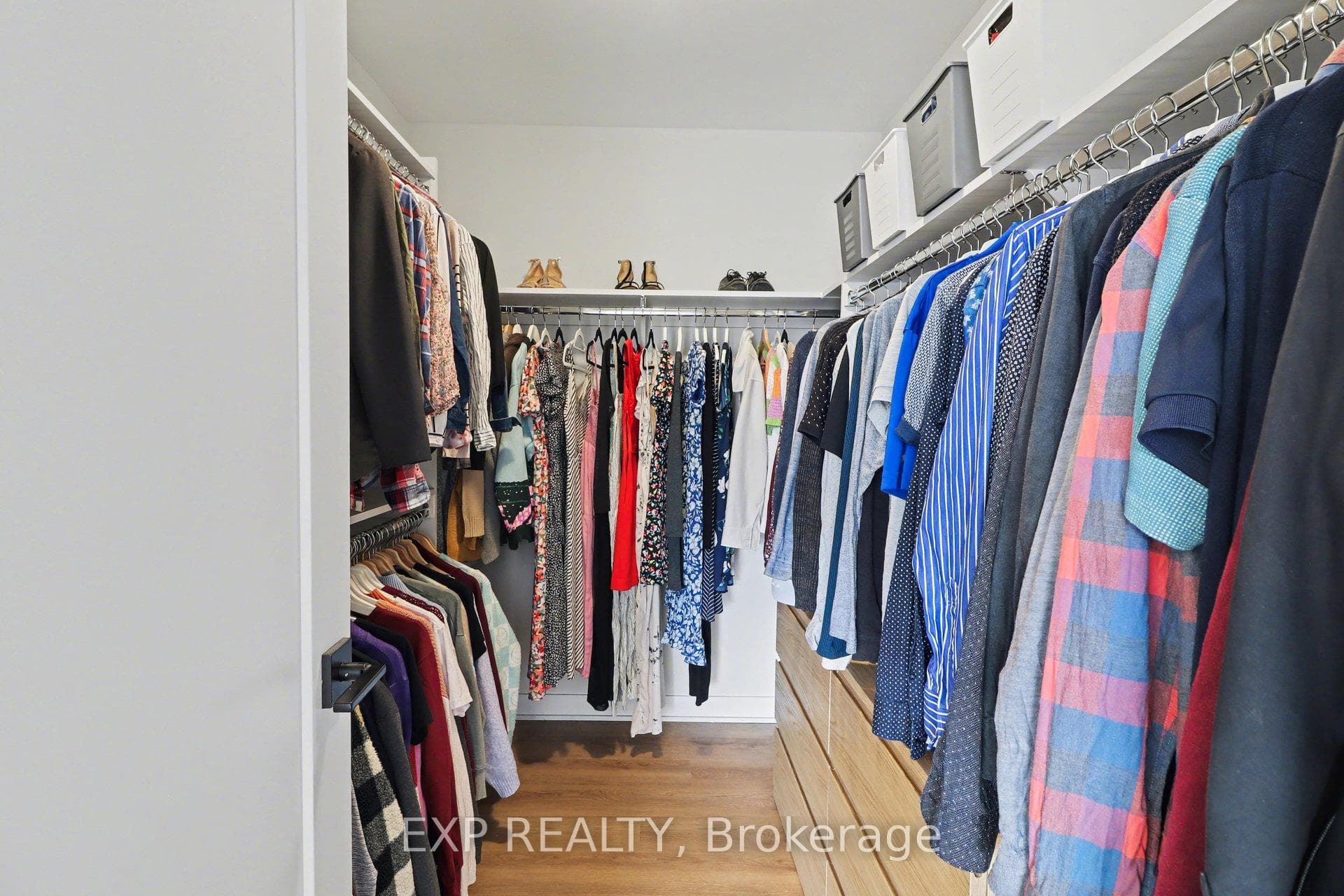 Primary bedroom walk-in closet.