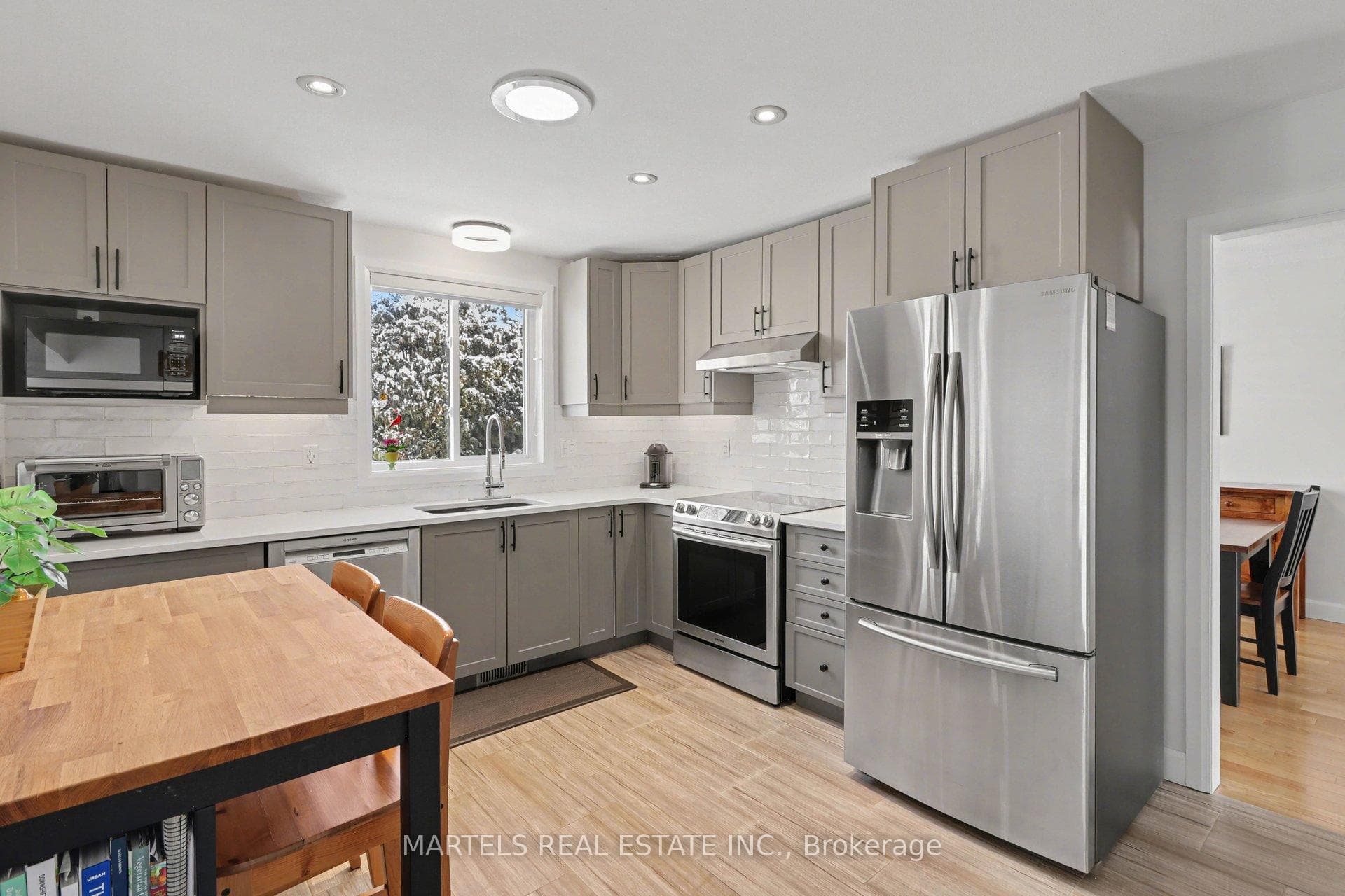 Renovated kitchen with quartz counter top