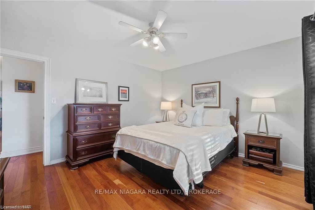 Bedroom featuring light hardwood / wood-style floo