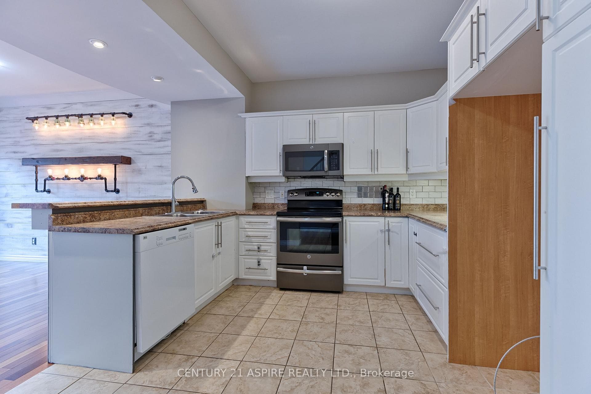 Stove, Microwave Hood Fan and Dishwasher included.