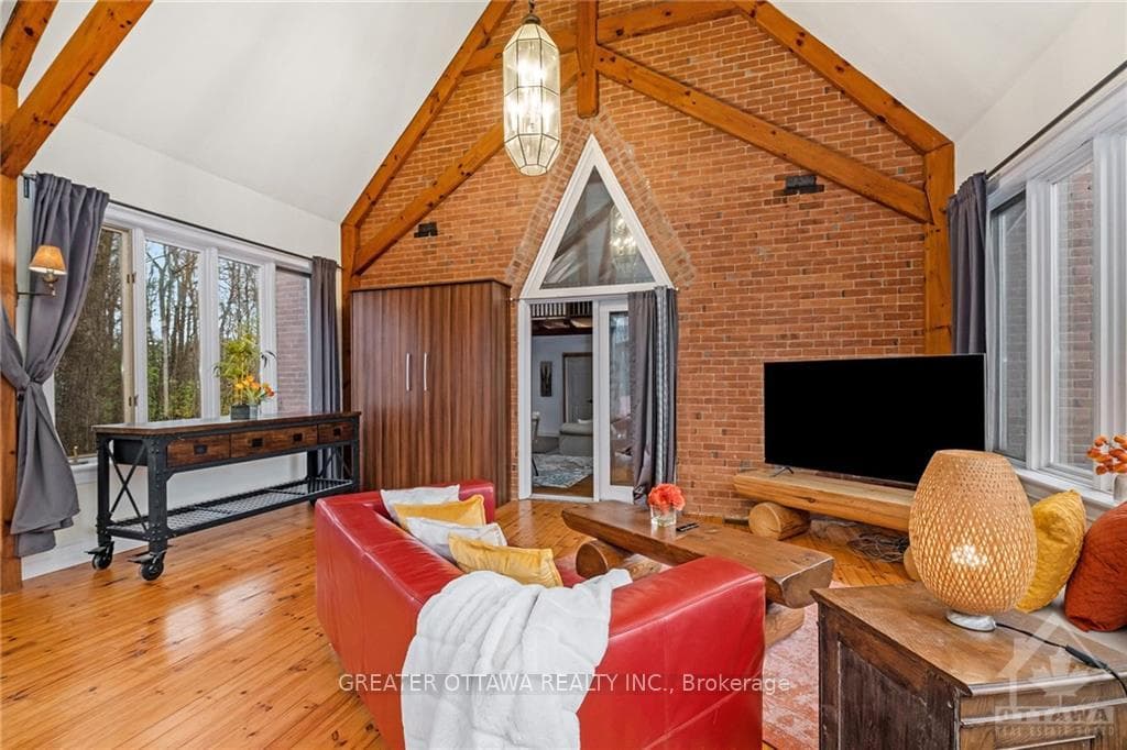 The brick wall as an accent from the sun room is r