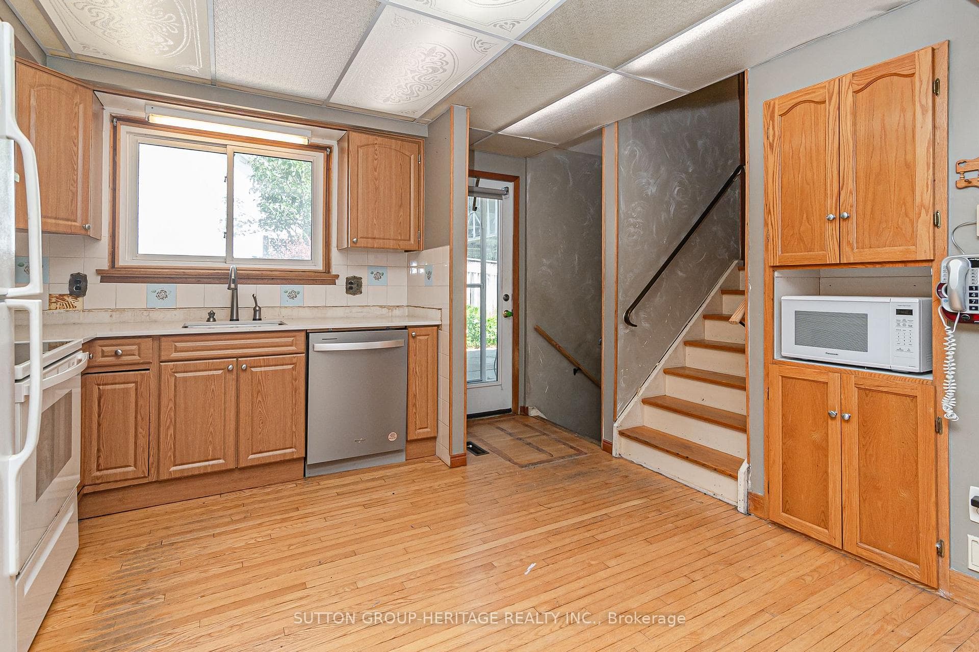 Kitchen with Side Entrance to Yard