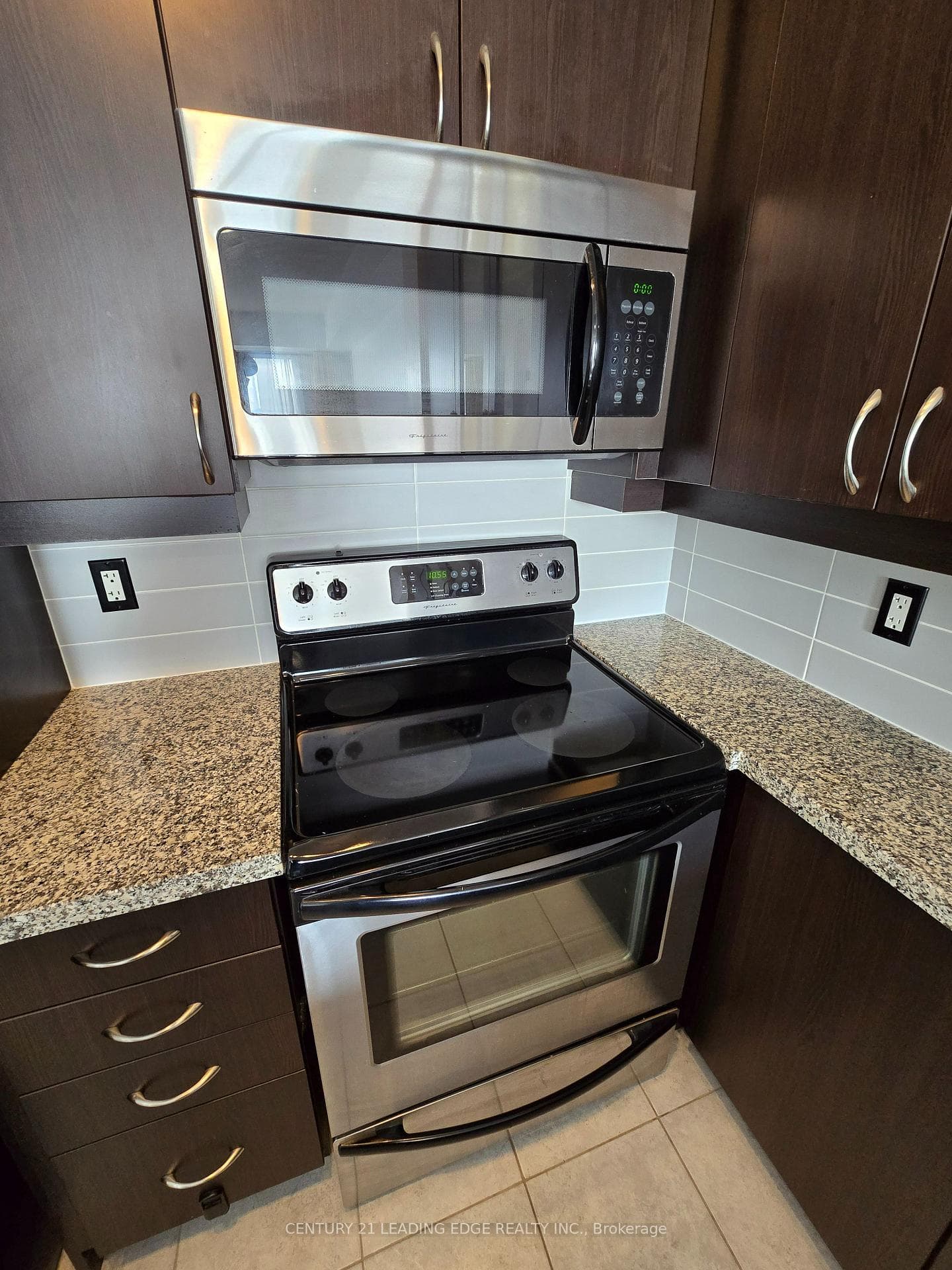 Frigidarie Stove and over-the-counter Microwave