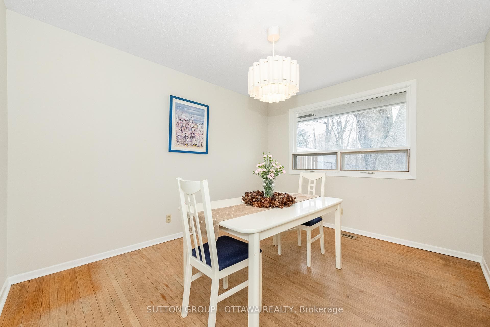 large dining room with view to back yard