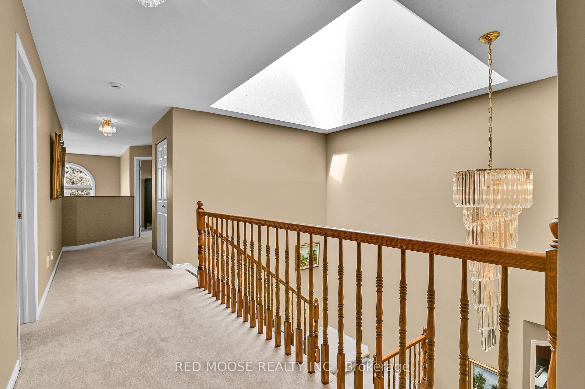 hallway to overlook and primary bedroom