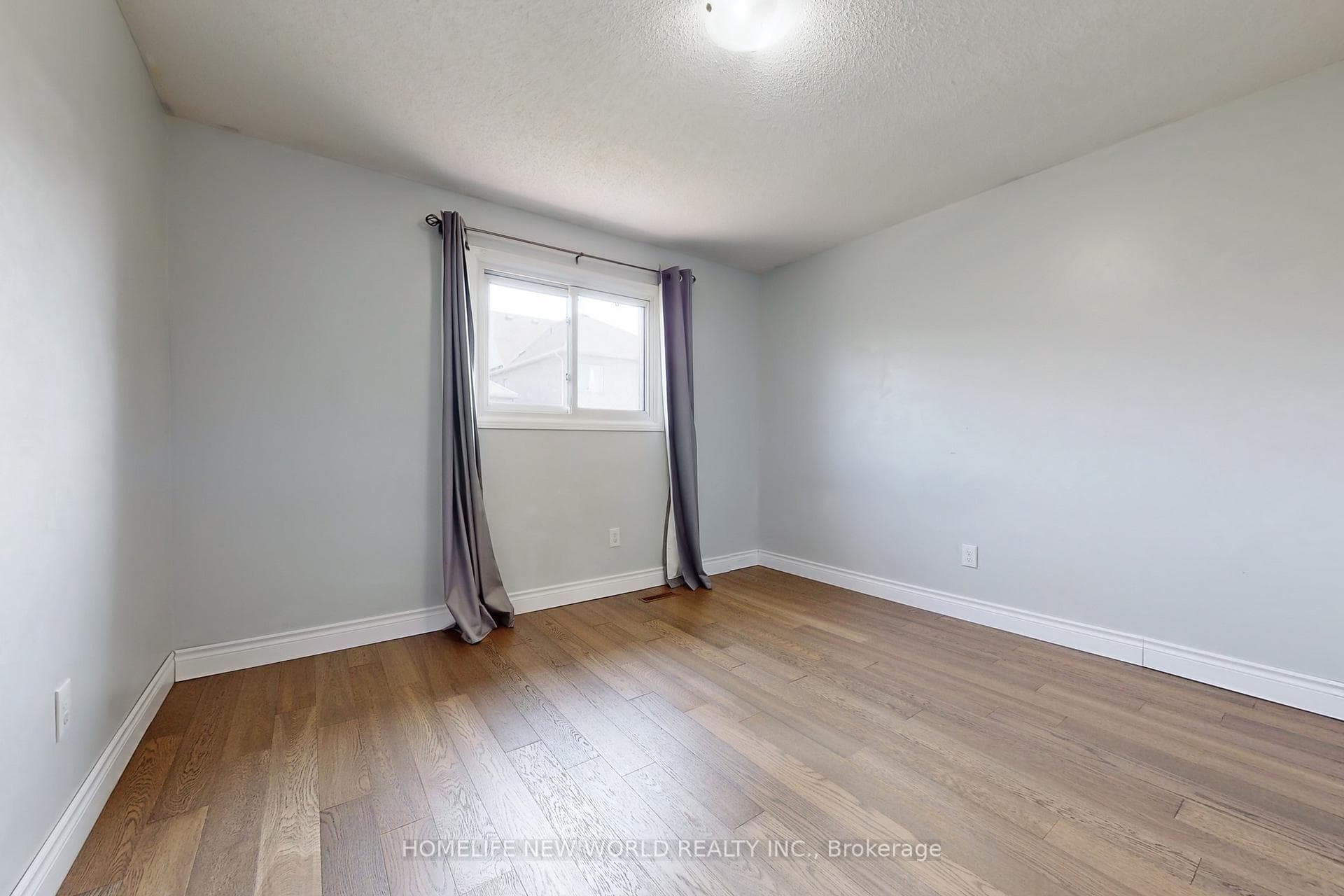 spacious 4th bedroom with large window