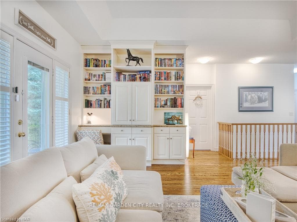 Built -in bookshelves, desk and storage.