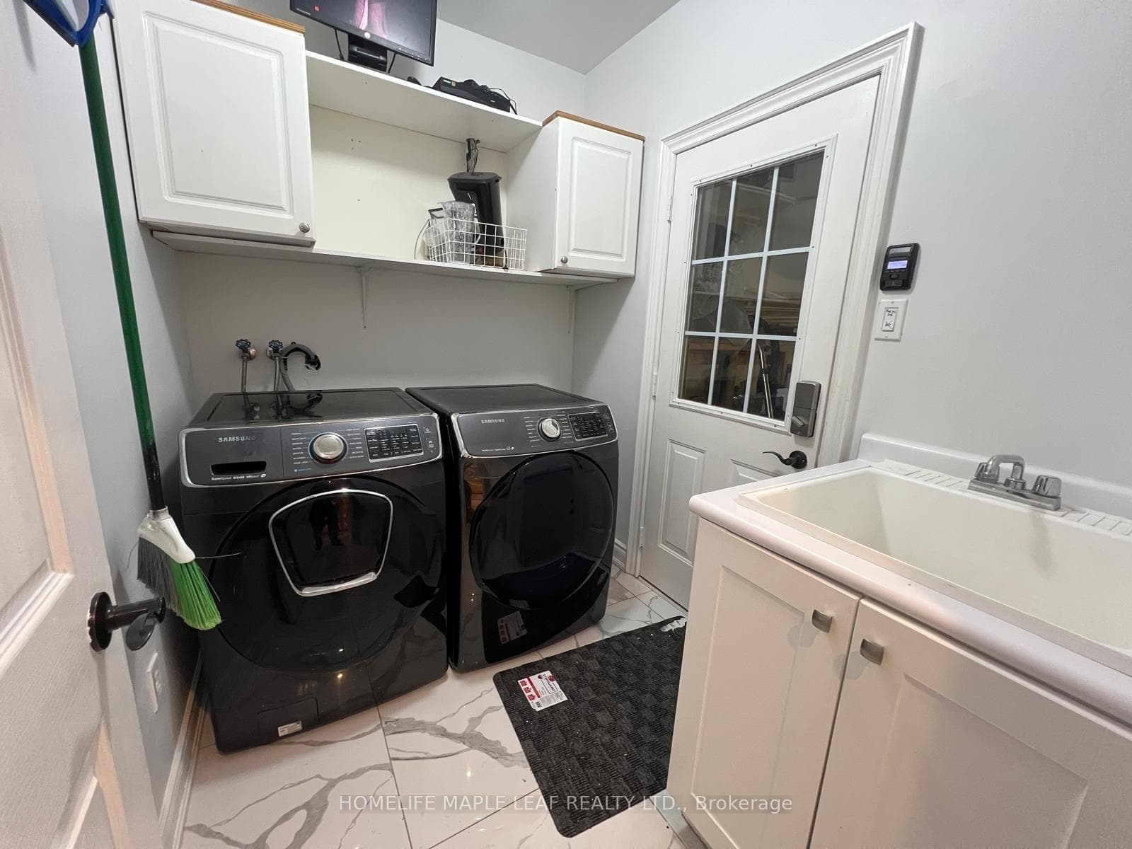 Laundry room with Garage Access