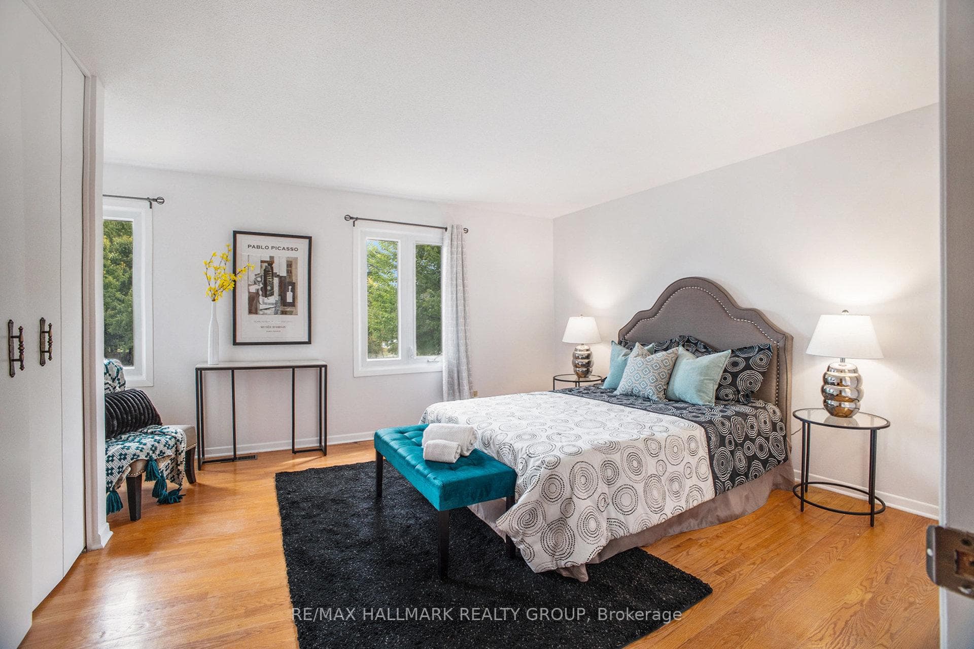 Primary bedroom, enjoys 2 windows overlooking park