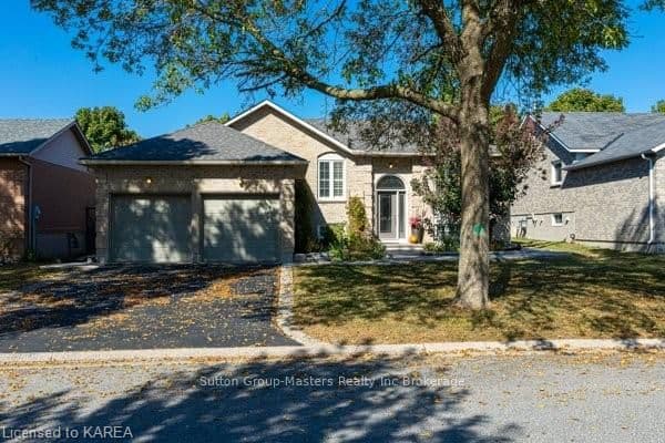 Double wide paved driveway with curbs