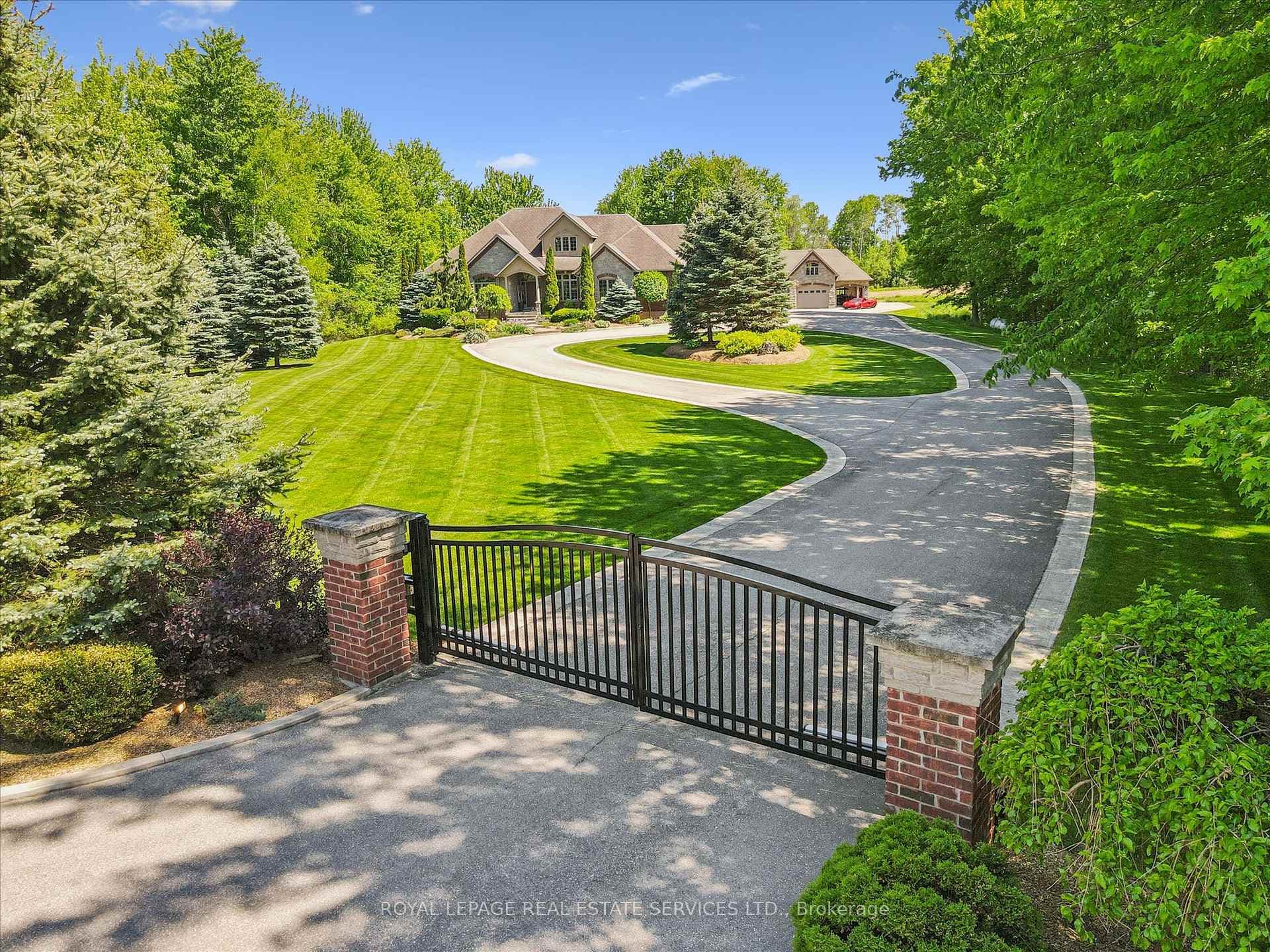 Exceptional Curb Appeal with Gated Entry!