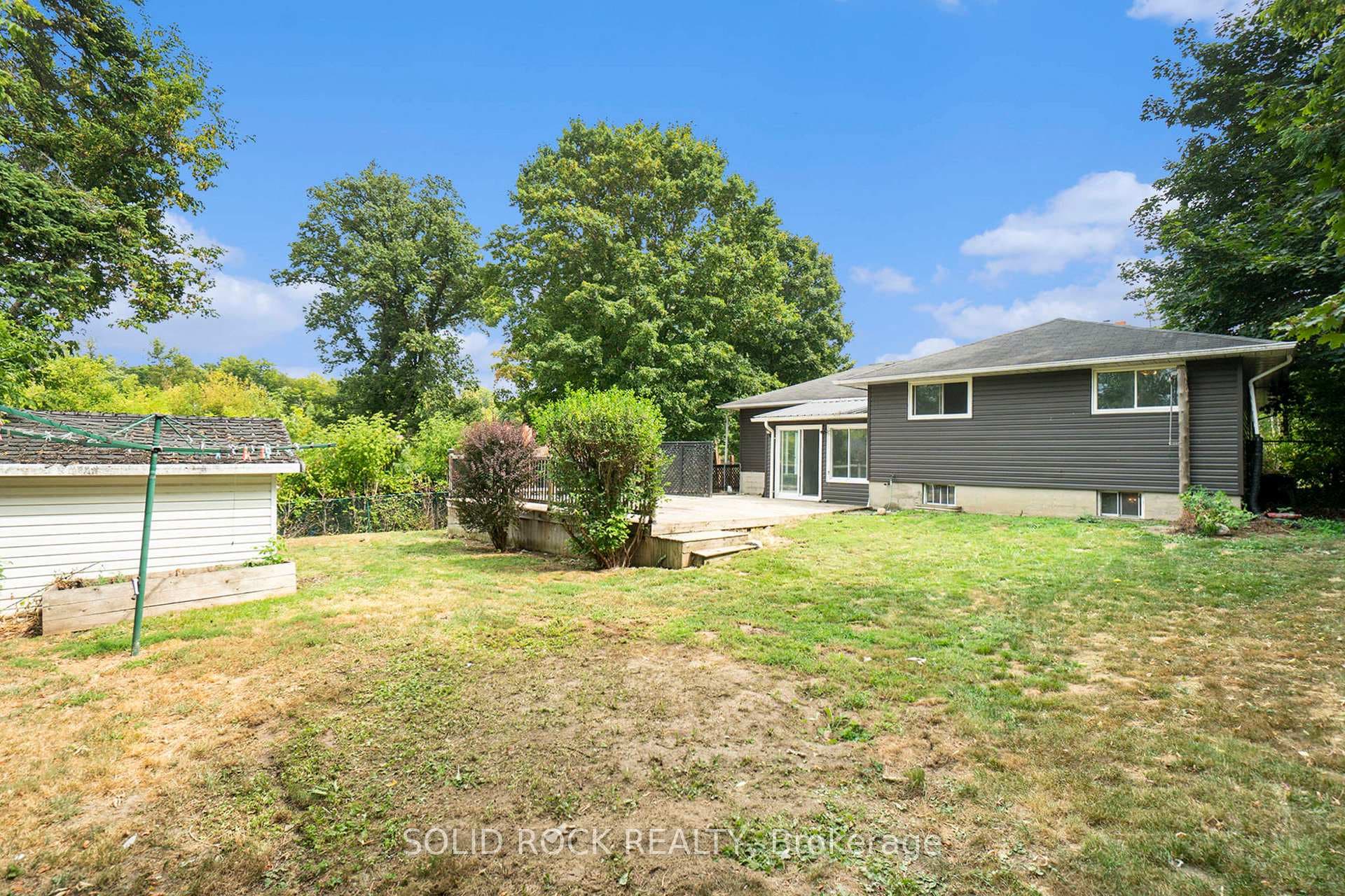 sprawling fenced back yard