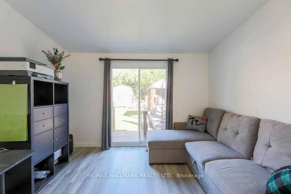 Family/Den With Walk out to Backyard