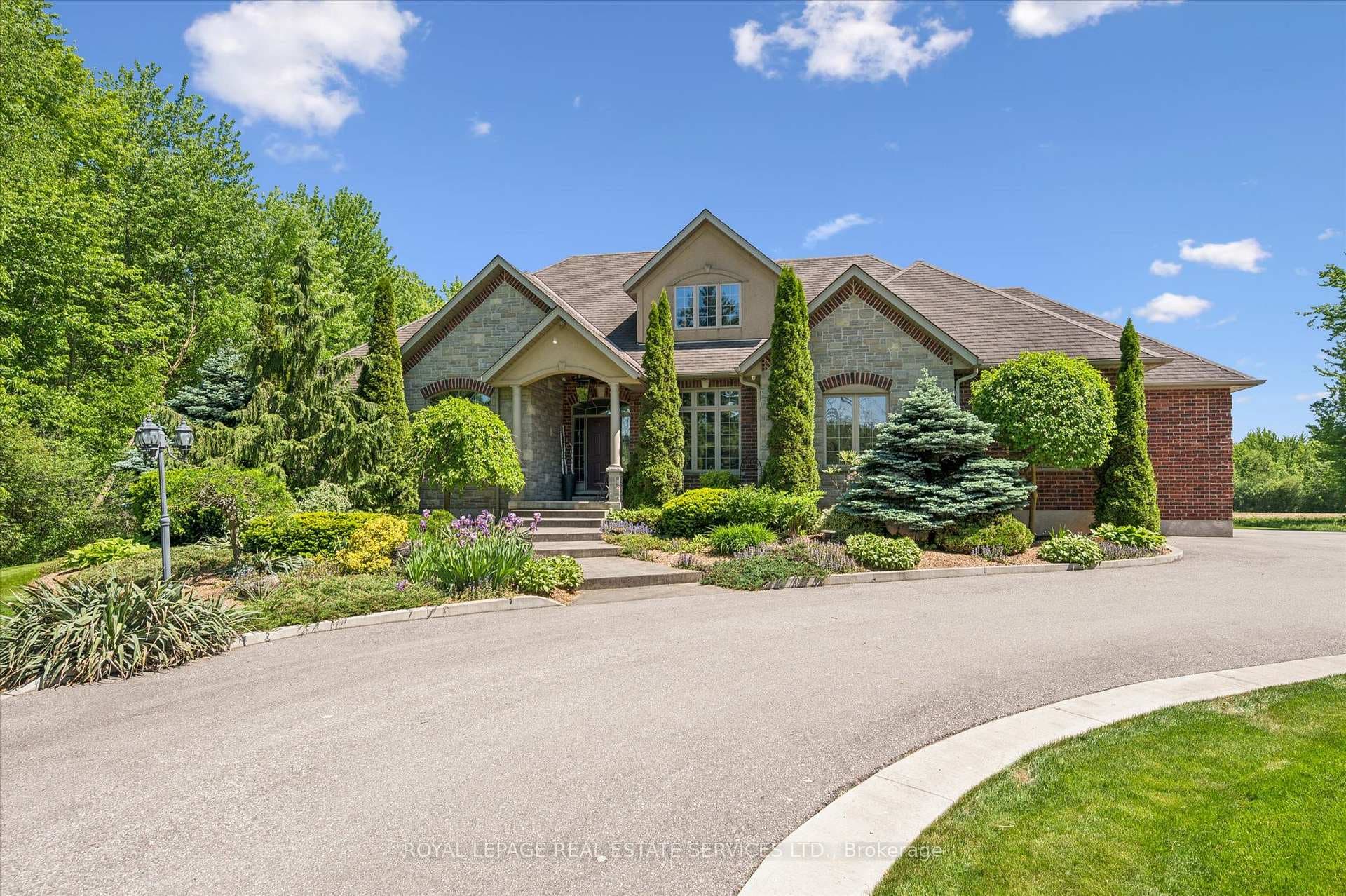 Magnificent Residence with Stone & Brick Exterior