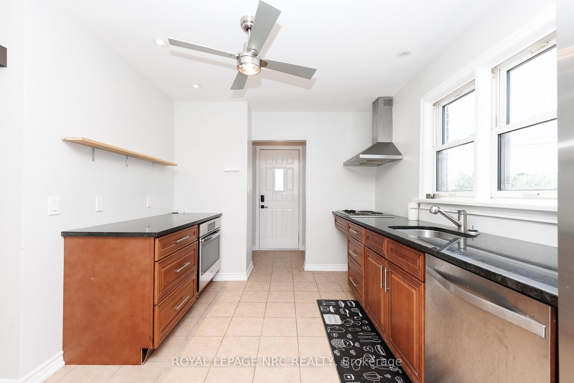 GRANITE COUNTERS AND MAPLE CABINETRY