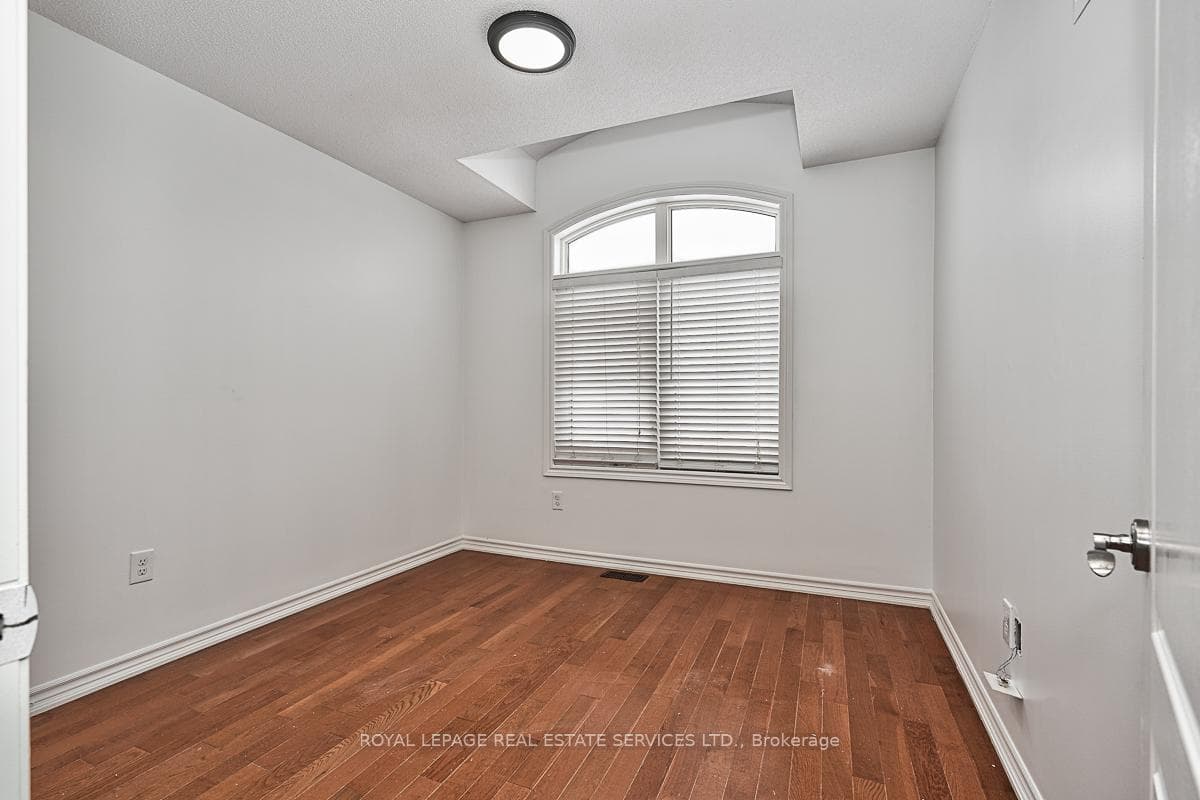 Third Bedroom with Hardwood Flooring