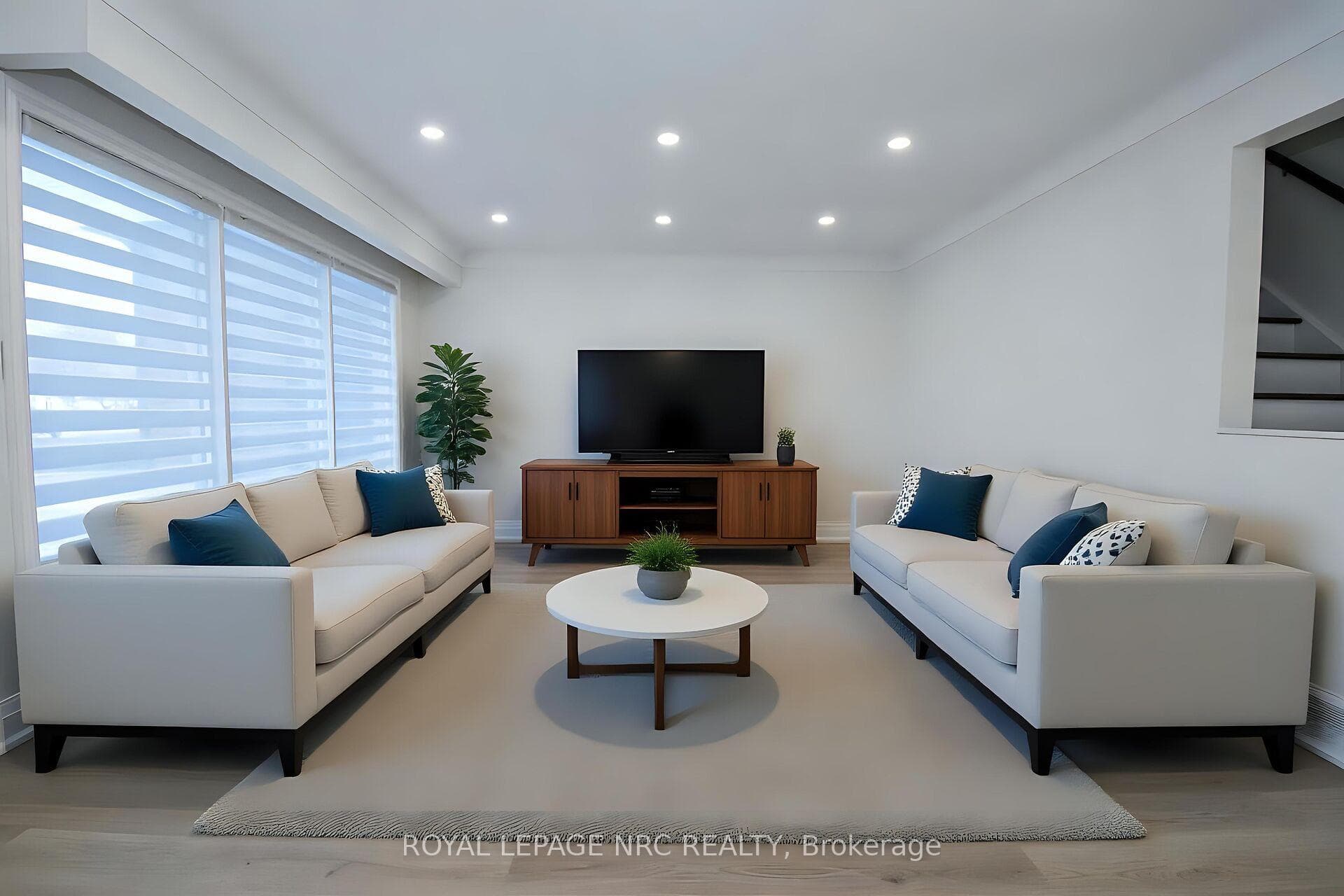 Bright living room virtually staged