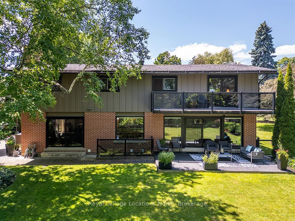 Backyard Oasis With Lower Level Porch & Upper Deck