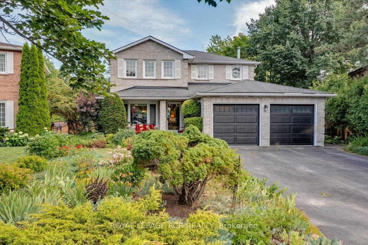 Front of Home with Perennial Gardens