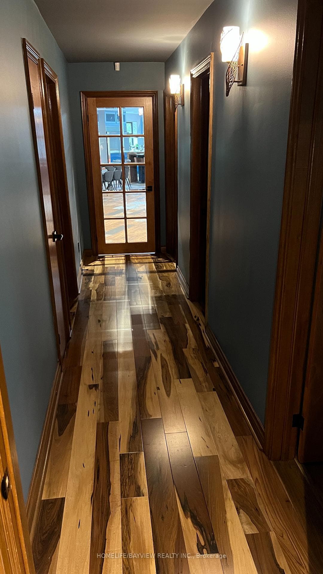 Bedrooms hallway with door to main living area