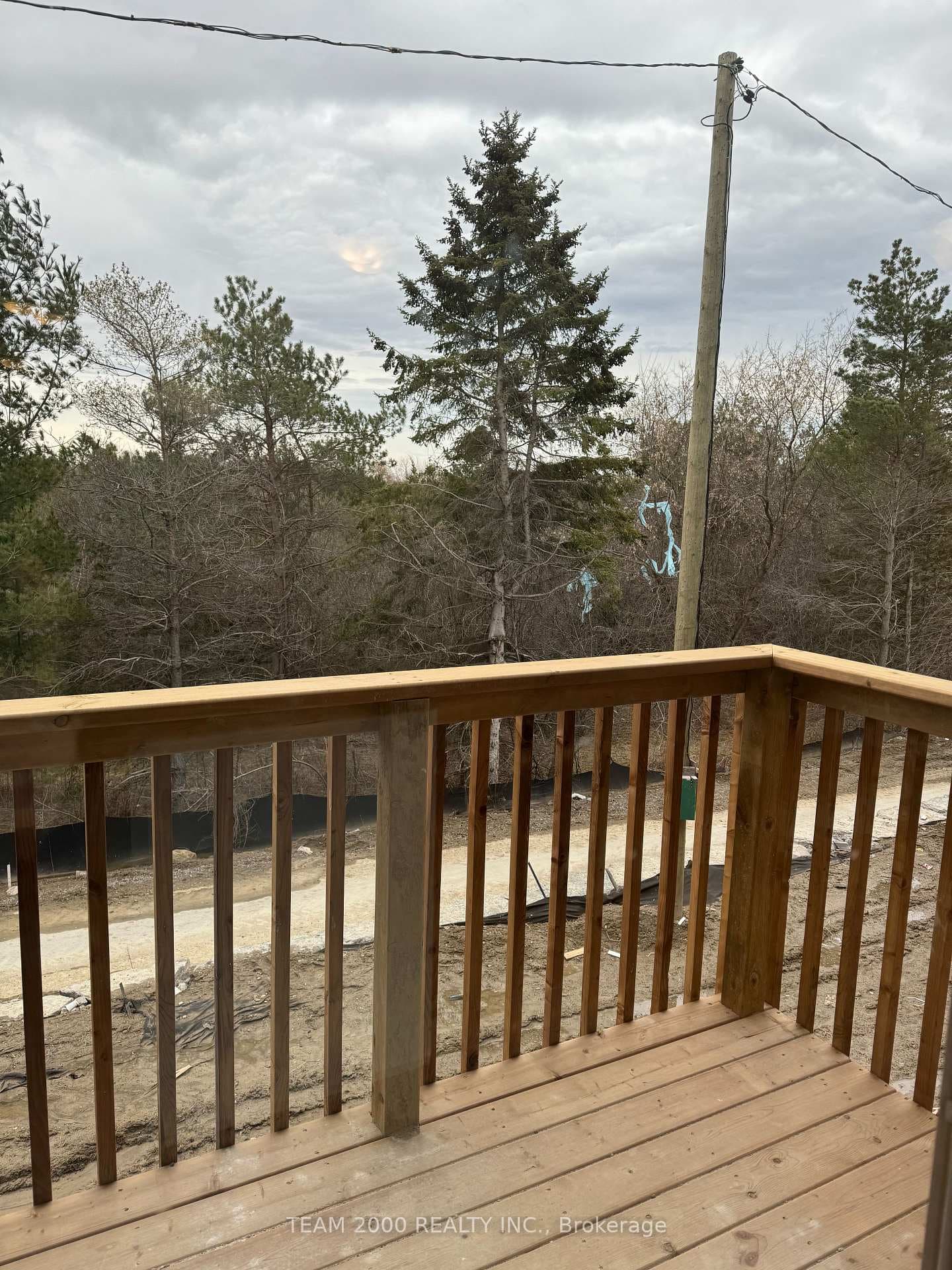 Deck off kitchen overlooking Woods