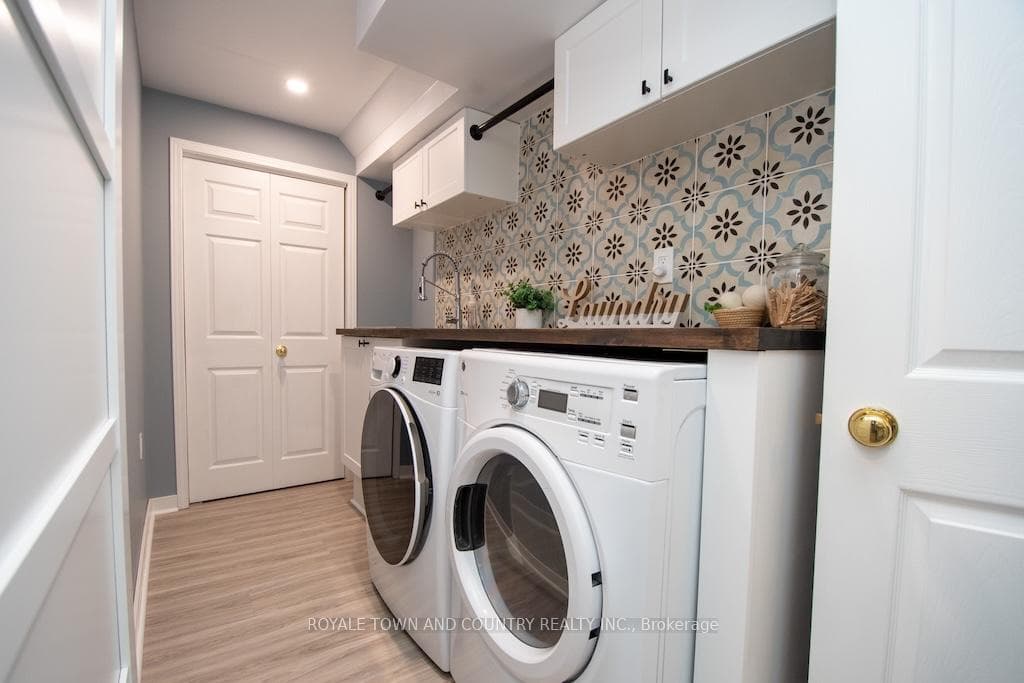 Finished laundry room PLUS storage