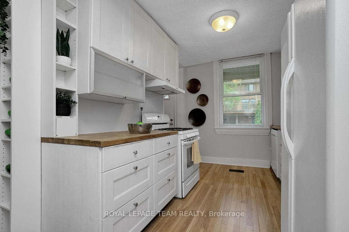 Kitchen has a large window overlooking the porch.