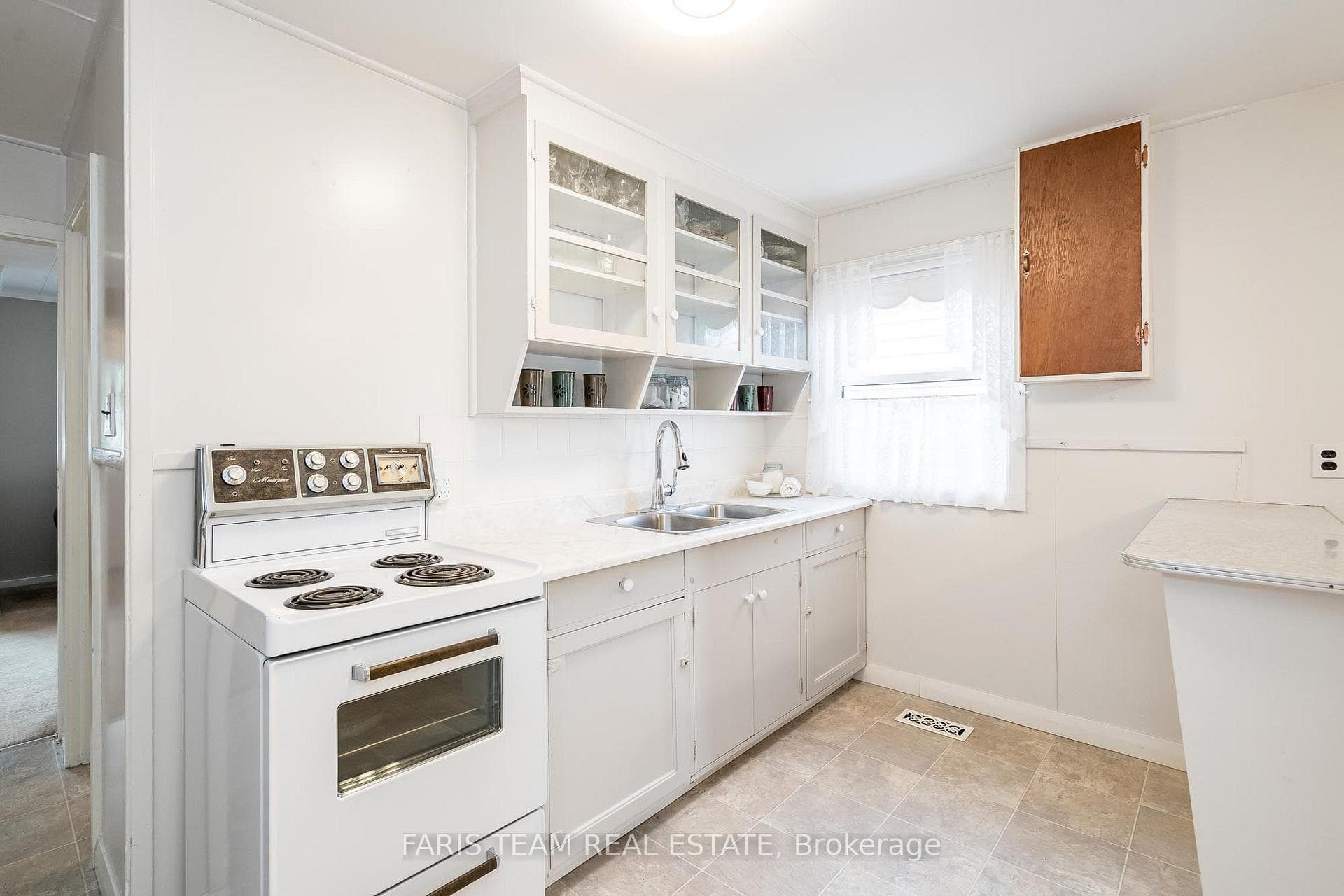 Stainless-steel sink and bright window