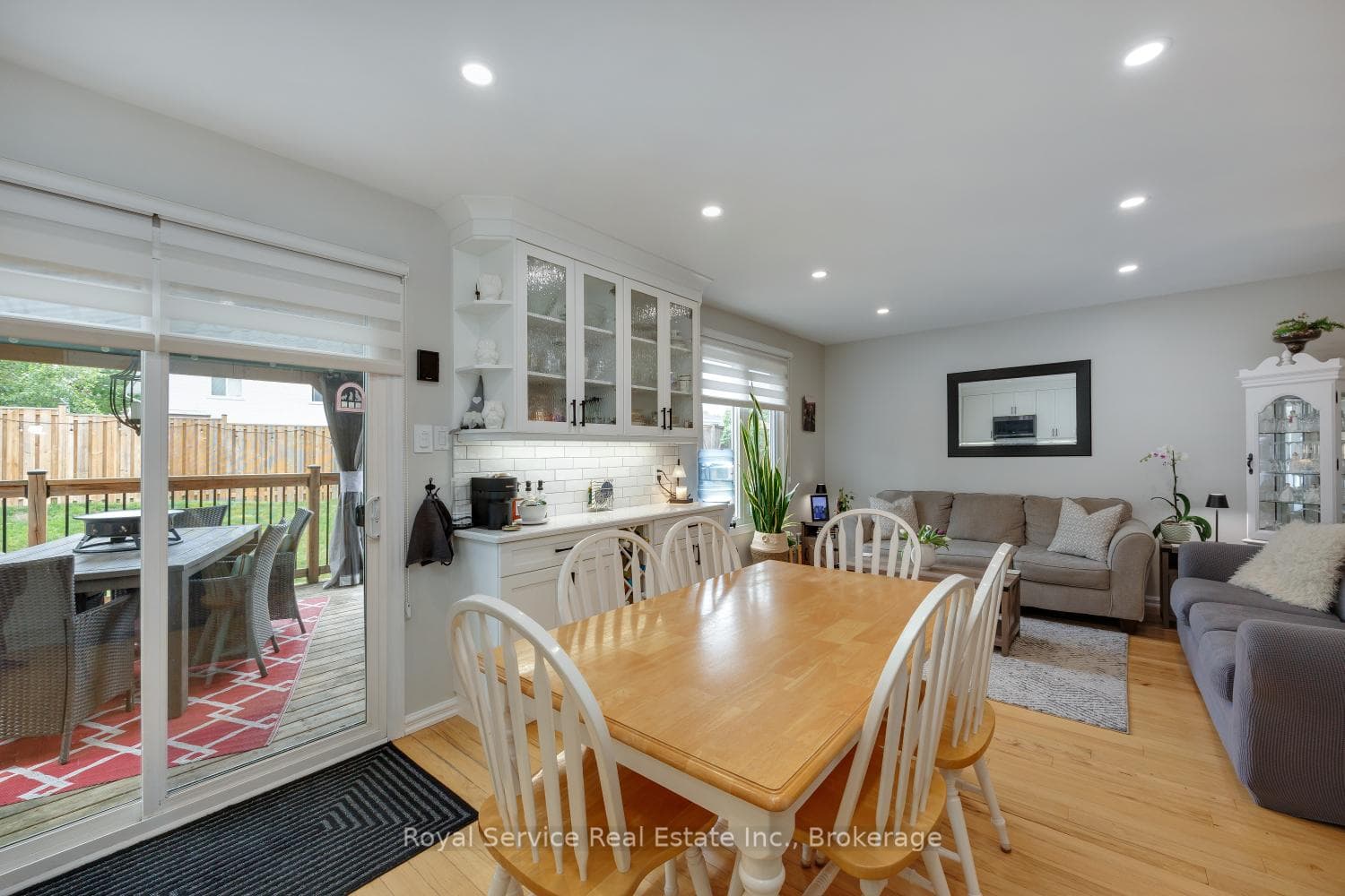 Walkout to covered deck and fully fenced backyard
