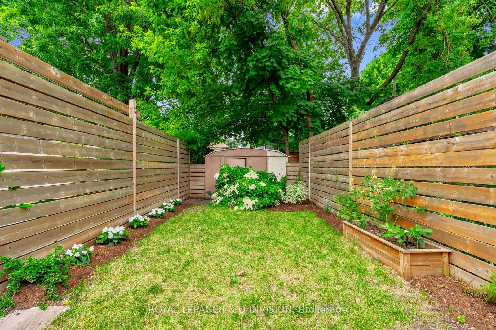 Long Back Yard with Storage Shed