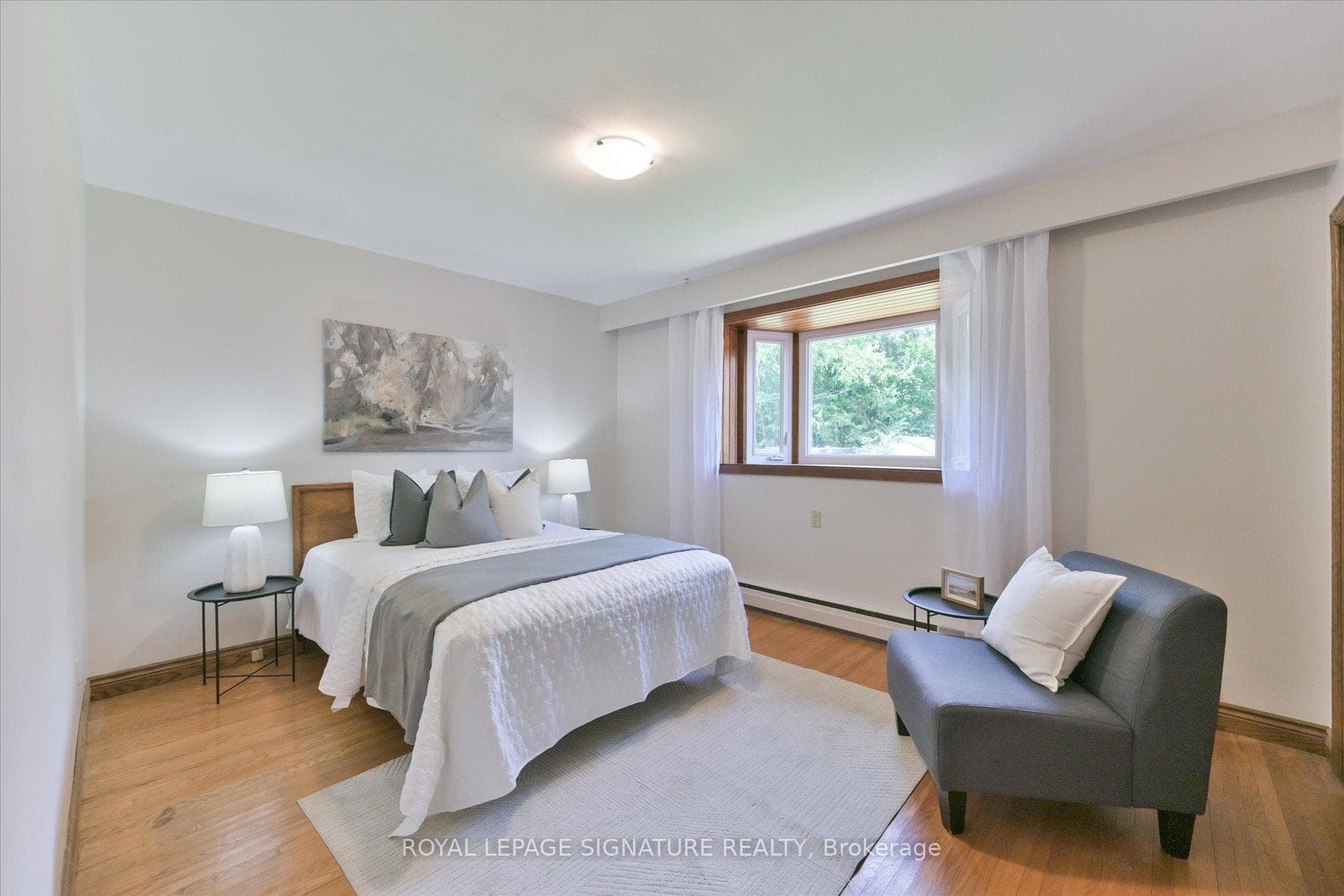 Primary bedroom with bay window