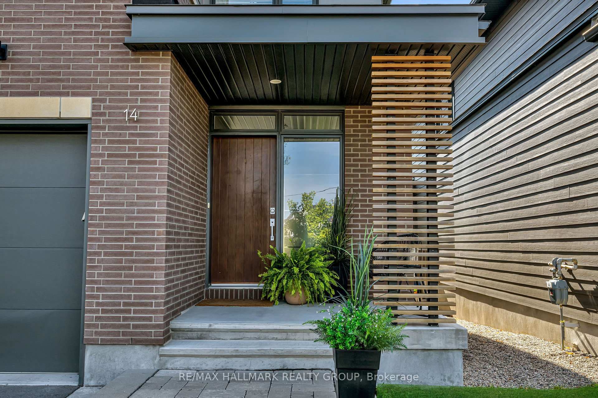 Covered front entry with wood accents