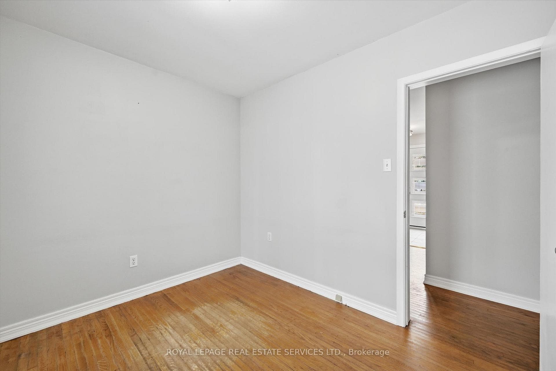 Second Bedroom with Hardwood Flooring