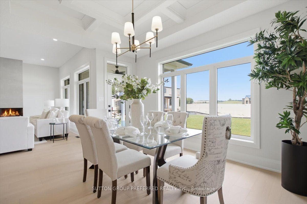 DINING WITH DOOR TO COVERED PATIO