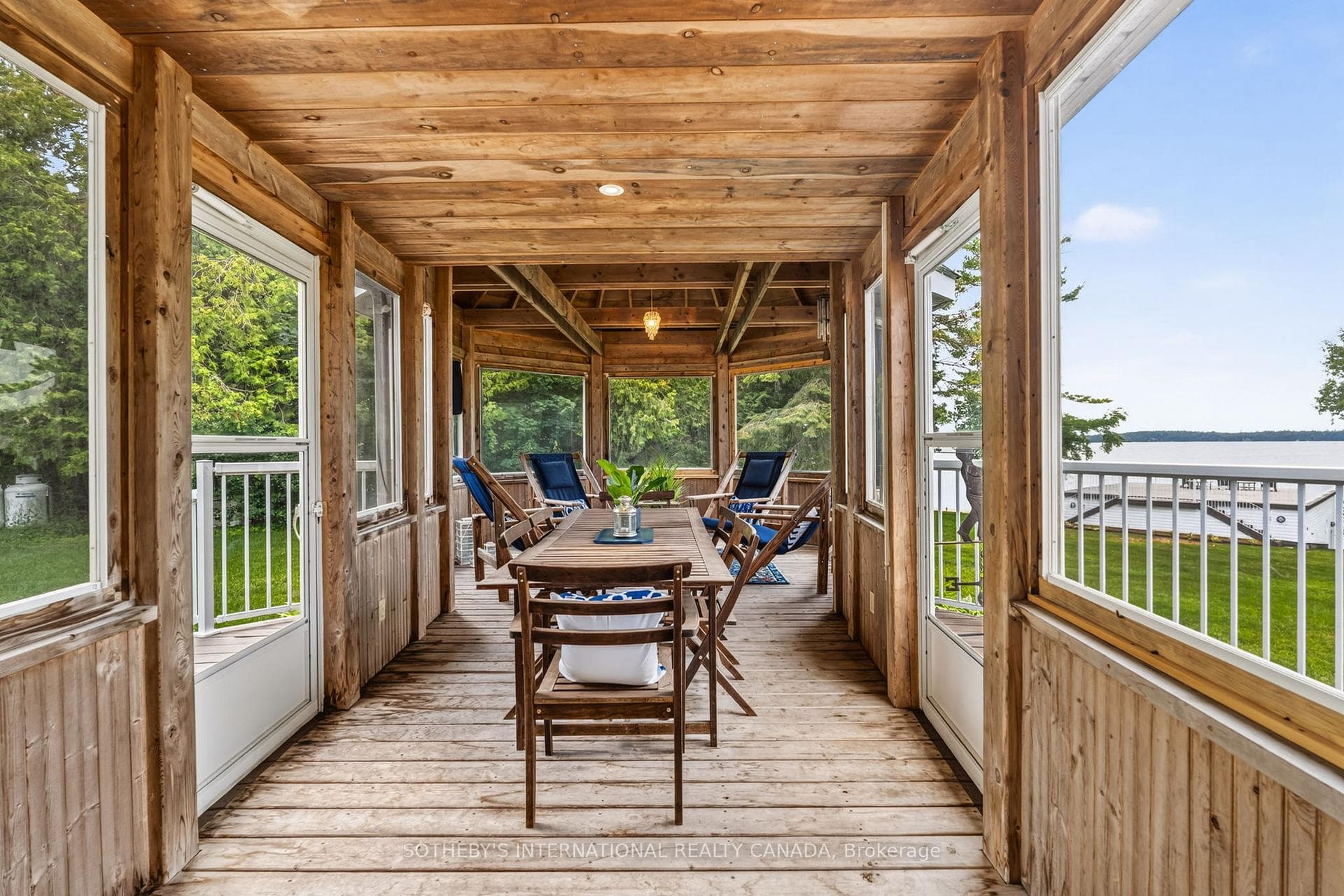 Screened porch dining area off kitchen.