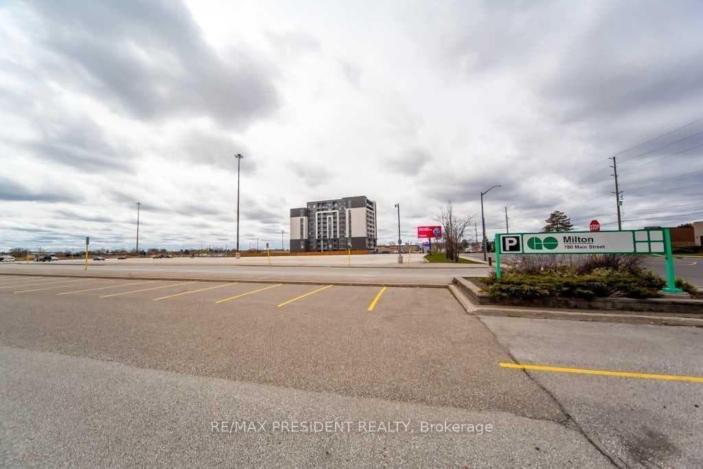 Directly beside Milton Go Station
