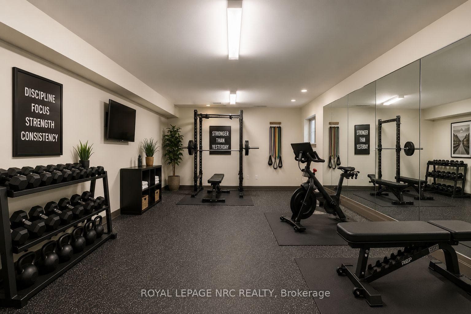 Room in basement perfect for gym *virtually staged