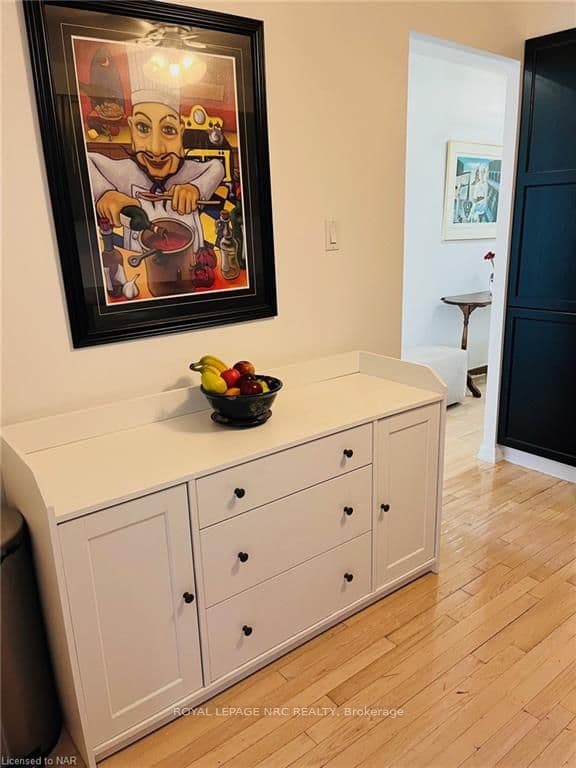 White cabinet in kitchen can stay.