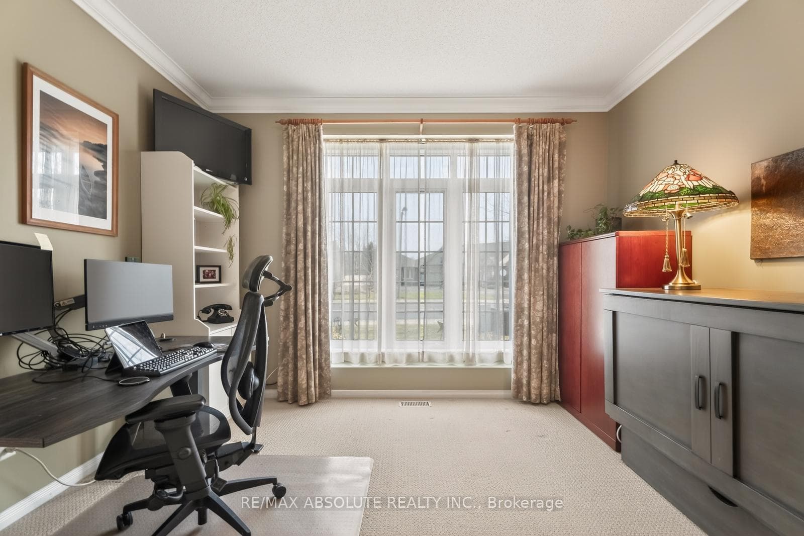 Bedroom 2 on main level with access to ensuite